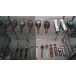 (lot of approx 40) Four shelves of beer tap handles, including Anchor Steam Christmas taps, Summer