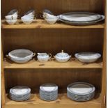 (lot of 46) Three shelves of Charles Ahrenfeldt for Limoges partial dinner service, executed in