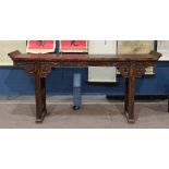 Chinese lacquered wooden altar table (qiao tou an), inset with a single floating panel flanked by