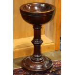 Liturgical holy water stoup, the round wood basin rising on a turned standard, 30.5" x 16"dia.