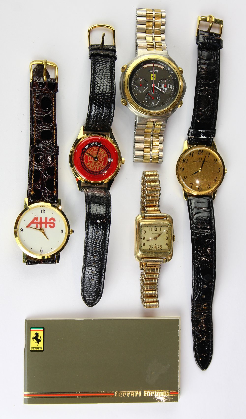(Lot of 5) Metal wristwatches Including one Ferrari two tone, metal quartz chronograph wristwatch,
