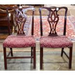 Pair of Chippendale style side chairs, having a serpentine crest rail and pierced splats, above
