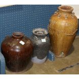 (lot of 3) Chinese glazed ceramic storage jars: first with a black glaze; second, of brown hue