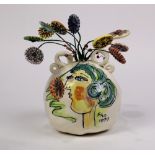 Ceramic studio sculpture, executed in the style of Picasso, having a polychrome glaze, with faux