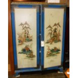 Chinoiserie decorated painted cabinet, the two-door case with polychrome figural reserves, opening