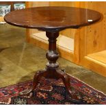 Queen Anne tilt top games table, c. 1840, rising on a turned standard above the tripod base, 28"h