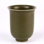 Chinese teadust glazed porcelain cup, with an everted rim and tall body, raised on a low tapering