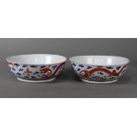 (lot of 2) Chinese enameled porcelain large shallow bowls, each exterior decorated with a pair of