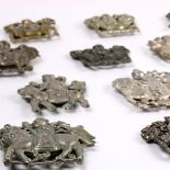 (lot of 13) Chinese silver plaques, each with a boy mounted on a qilin, 3.25"w