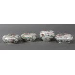 (lot of 4) Chinese porcelain small covered boxes, each with figures on the cover, flowers and