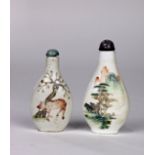 (lot of 2) Chinese enameled porcelain snuff bottles, each with a flattened pear shaped body, one