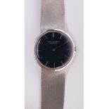 White gold wristwatch Dial: round, blue applied white gold baton hour markers, white gold baton