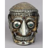 Himalayan kapala ritual skull, with a hinged skull cap decorated carvings with Buddhist treasures,