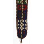 Yoruba beaded hanging totem, executed in green, blue and red beads, 6'8''l x 7"w