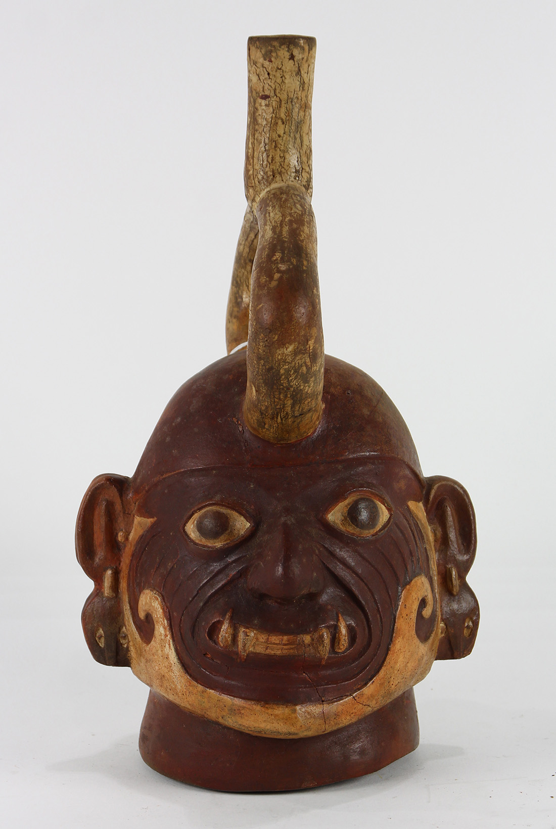 Pre-Columbian Moche stirrup vessel, depicting the head of a tribal ruler, (restored), 12"h x 6"w x - Image 2 of 4