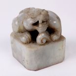 Chinese hardstone seal, depicting a recumbent mythical beast, above a square plinth, base with