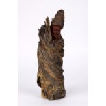 Chinese wooden figural carving, the face carved with a smile, the robe and hat incorporating the