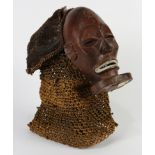 Chokwe, Angola, tribal mask, having a woven head piece, 10"h