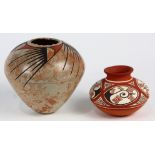 (lot of 2) Native American vase group, one having a tapered form with a marbleized finish, the other