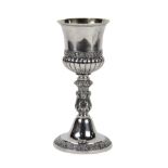 German silver wine goblet circa 1840, having a flaring rim, the interior of cup gilded, the body
