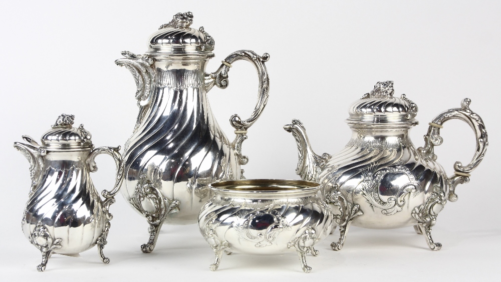 (lot of 4) Rococo style 800 silver hot beverage service, consisting of a tea pot, coffee pot, a