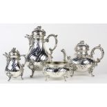 (lot of 4) Rococo style 800 silver hot beverage service, consisting of a tea pot, coffee pot, a