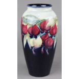 Moorcroft vase, circa 1928-1949, decorated with polychrome flowers in the "Wisteria" pattern, signed