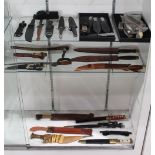 (lot of 38) Collection of knives and daggers, many fitted in sheaths, also including pocket knives