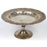 Rococo style silver plate compote, the repousse worked rim having an ornate scroll motif, rising