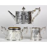 (lot of 3) Wang Hing Chinese export sterling silver tea set, having an engraved flora and fauna
