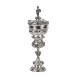 Austro-Hungarian covered silver wine goblet circa 1880, the conforming repousse lid surmounted by