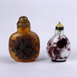 (lot of 2) Chinese glass overlay snuff bottles: first, with two aubergine goldfish on a frosted