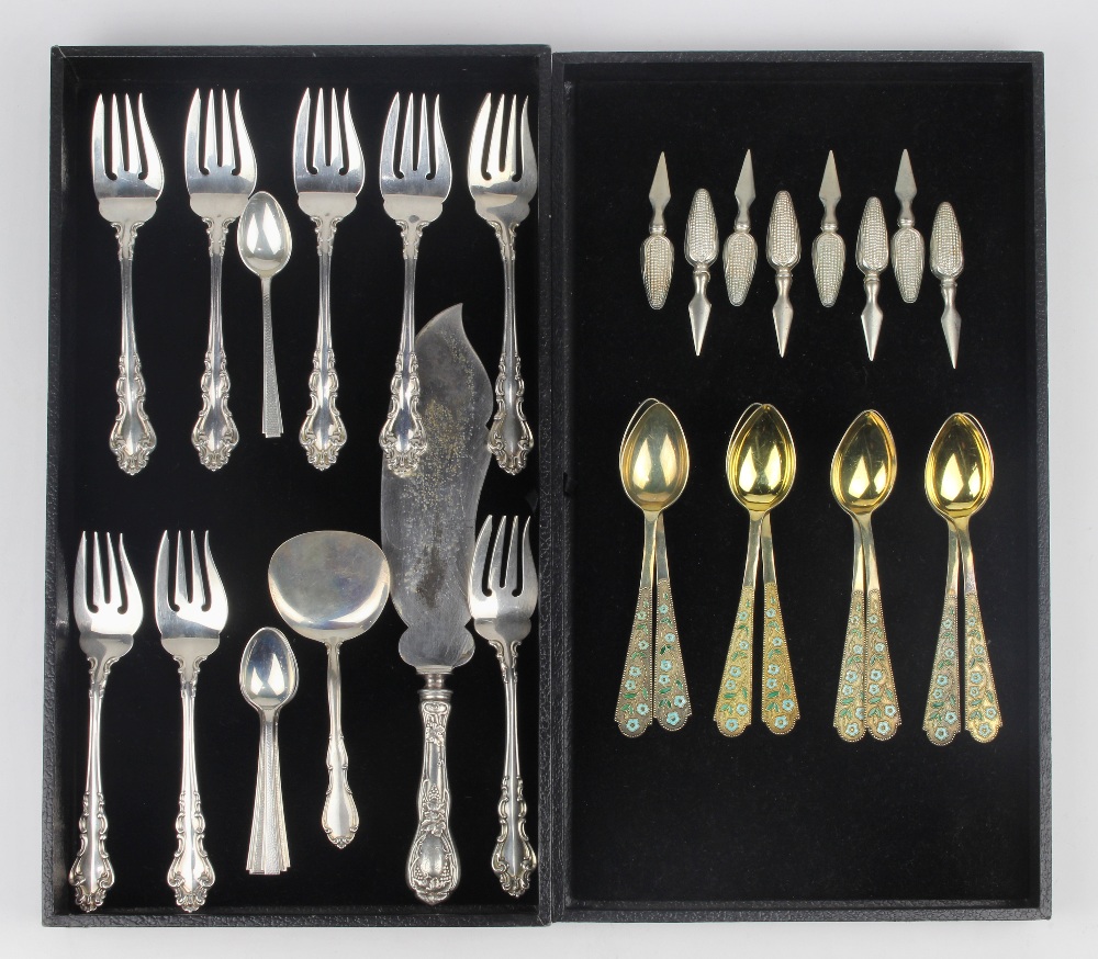 (lot of 31) Sterling silver utensil group, consisting of (8) Reed and Barton fish forks, executed in