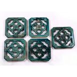 (lot of 5) Chinese green glazed ceramic tiles, with openwork floral pattern to the center with