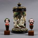 (lot of 3) Figural wine stopper group, consisting of a female wearing garland, and a male with