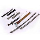 (lot of 4) Group of Southeast Asian swords and daggers, including a kris with a sheath wrapped in