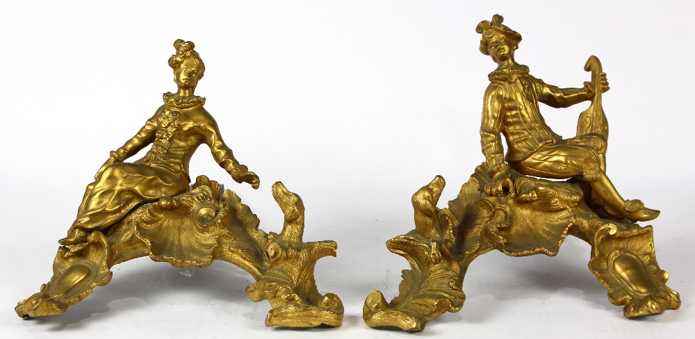 Pair of Louis XV style gilt bronze andirons, each decorated with a figure of a youth dressed in - Image 2 of 4