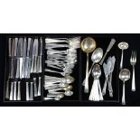 (lot of 81) Continental .800 silver flatware group, having an all over hand hammered pattern,