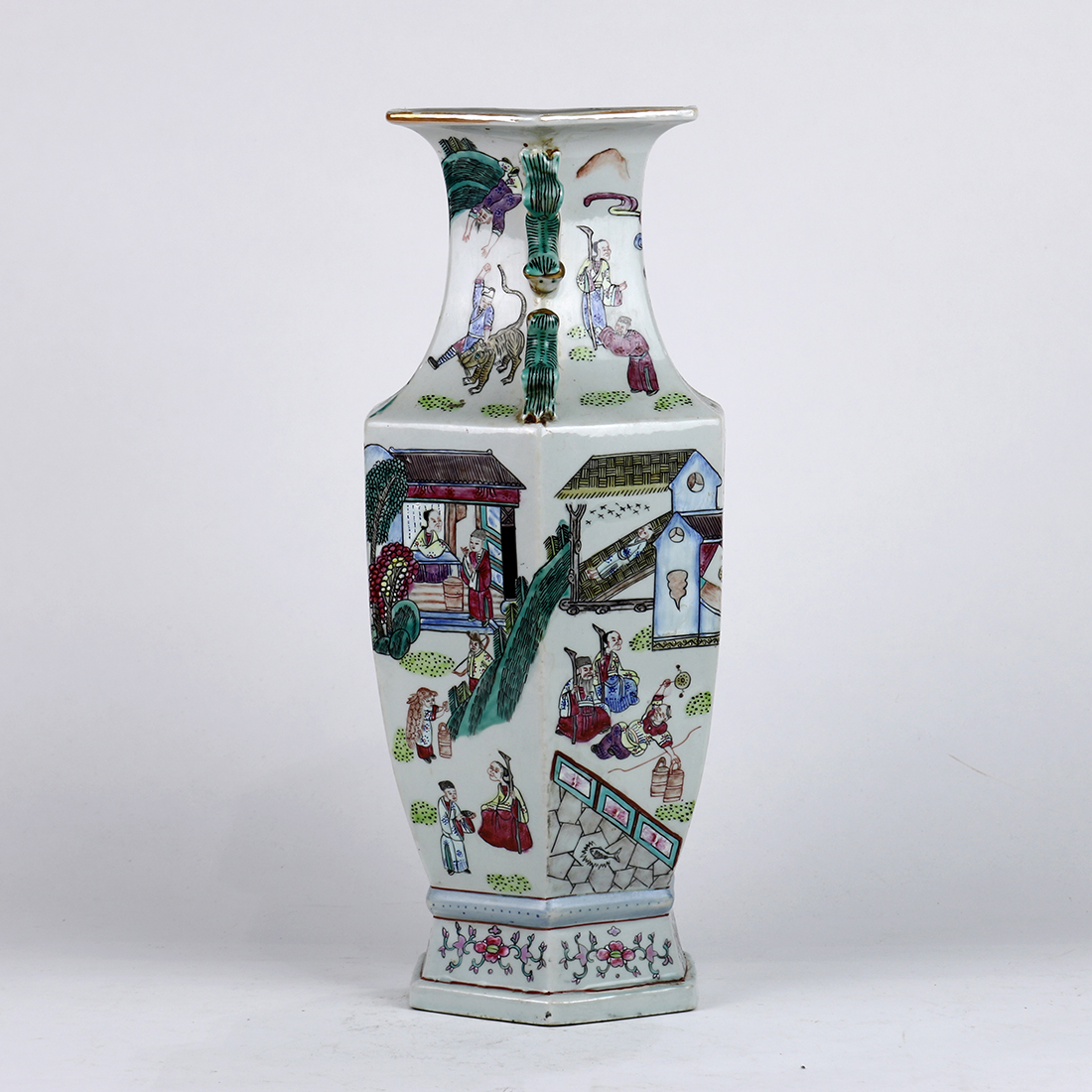 Chinese enameled porcelain vase, of hexagonal shape decorated with village scenes of figures in - Image 4 of 6