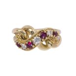 Cartier ruby, diamond and 18k yellow gold ring Featuring (4) round-cut rubies, weighing a total of