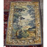 Brussels verdue tapestry, depicting a wooded and floral foreground with a path leading to the