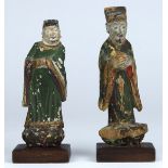 (lot of 2) Chinese polychrome wood figures, each of a standing official in court attire, figure: