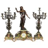(lot of 3) Renaissance style bronze patinated metal clock with garnitures, the clock surmounted with