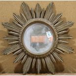 Italian style sunburst gilt mirror, having a circular looking glass, 23"h