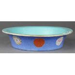 Chinese enameled porcelain underdish, the exterior featuring floral roundels on the blue sgraffito