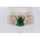 Emerald, diamond, platinum and gold ring Centering (1) emerald-cut emerald, weighing approximately