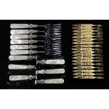 (lot of 30) Mother of pearl and gilt table utensils, including of a mother of pearl handled fish