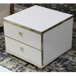 Mid Century occasional cabinet, having a white case with brass accents and two drawers, 17"h x 19.