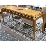 Contemporary console table, having a rectangular bevel top with inlaid sides, surmounting the