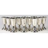 (lot of 12) American sterling silver cordial cups, each having a flaring rim over an ovoid